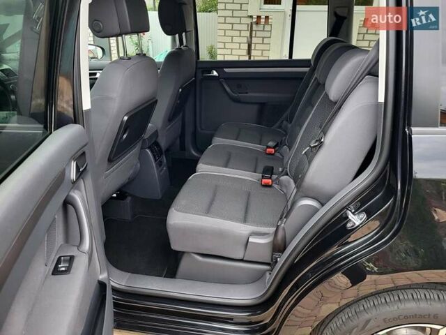 Черный Фольксваген Туран, объемом двигателя 1.6 л и пробегом 204 тыс. км за 11950 $, фото 63 на Automoto.ua