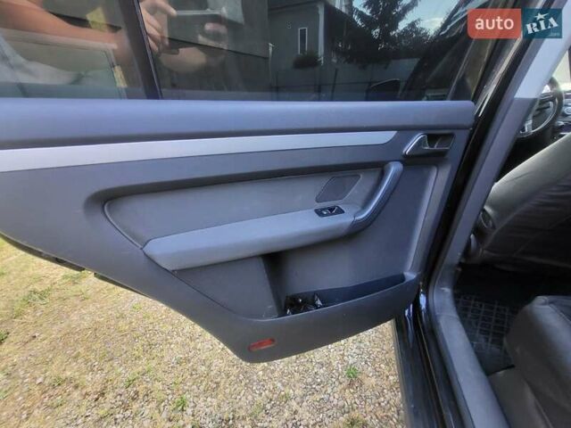 Чорний Фольксваген Туран, об'ємом двигуна 1.6 л та пробігом 195 тис. км за 10300 $, фото 5 на Automoto.ua