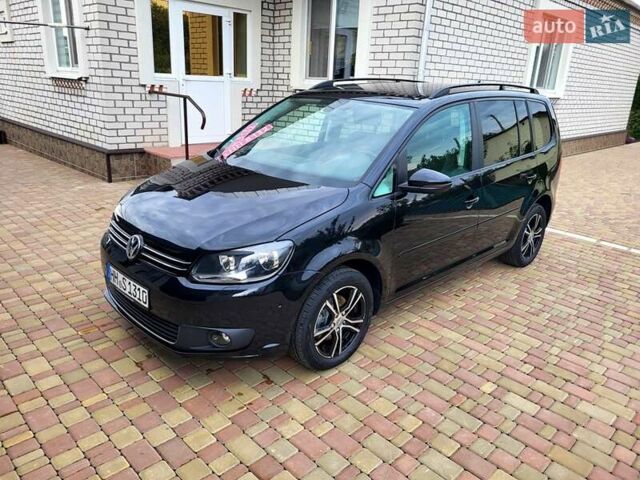 Черный Фольксваген Туран, объемом двигателя 1.6 л и пробегом 204 тыс. км за 11950 $, фото 4 на Automoto.ua