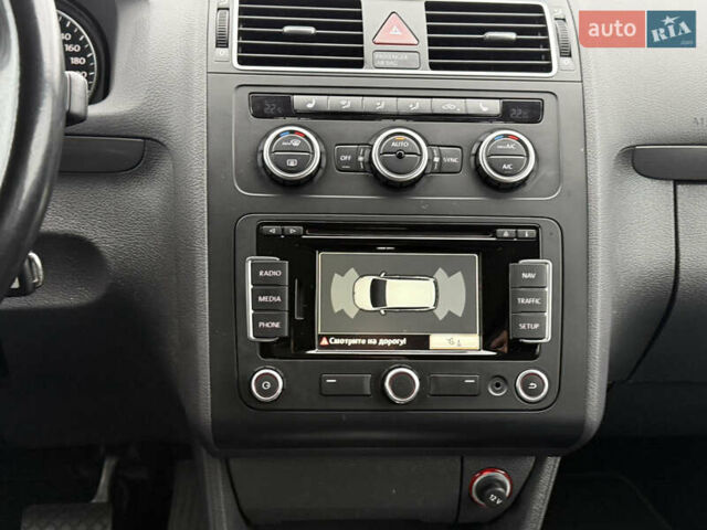 Черный Фольксваген Туран, объемом двигателя 1.6 л и пробегом 211 тыс. км за 11300 $, фото 48 на Automoto.ua