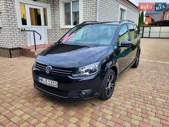 Черный Фольксваген Туран, объемом двигателя 1.6 л и пробегом 204 тыс. км за 11950 $, фото 2 на Automoto.ua