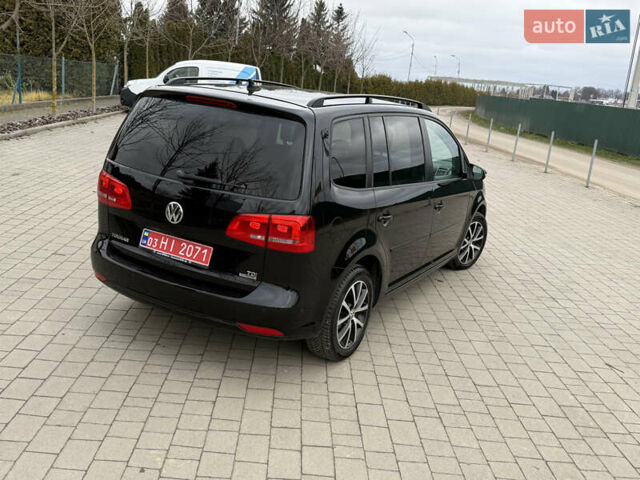 Черный Фольксваген Туран, объемом двигателя 1.6 л и пробегом 211 тыс. км за 11300 $, фото 5 на Automoto.ua
