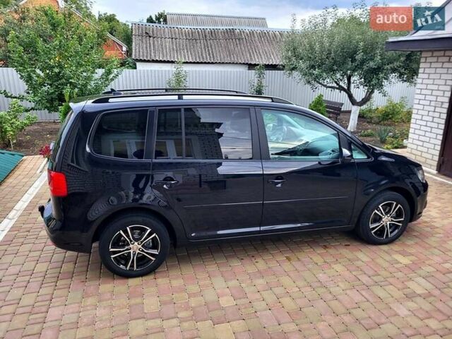 Черный Фольксваген Туран, объемом двигателя 1.6 л и пробегом 204 тыс. км за 11950 $, фото 18 на Automoto.ua