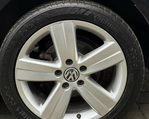 Черный Фольксваген Туран, объемом двигателя 1.4 л и пробегом 171 тыс. км за 10799 $, фото 2 на Automoto.ua