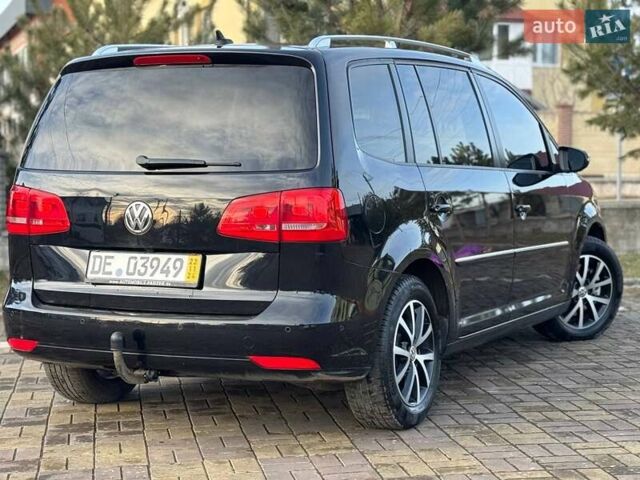 Чорний Фольксваген Туран, об'ємом двигуна 2 л та пробігом 172 тис. км за 14500 $, фото 30 на Automoto.ua