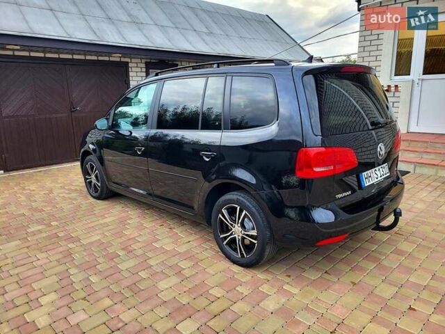 Черный Фольксваген Туран, объемом двигателя 1.6 л и пробегом 204 тыс. км за 11950 $, фото 10 на Automoto.ua