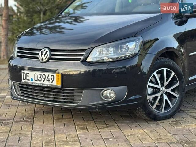 Чорний Фольксваген Туран, об'ємом двигуна 2 л та пробігом 172 тис. км за 14500 $, фото 2 на Automoto.ua