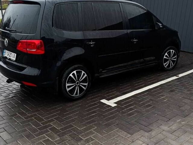 Черный Фольксваген Туран, объемом двигателя 1.4 л и пробегом 200 тыс. км за 10500 $, фото 6 на Automoto.ua