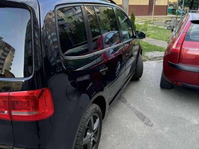 Черный Фольксваген Туран, объемом двигателя 1.4 л и пробегом 224 тыс. км за 9990 $, фото 2 на Automoto.ua