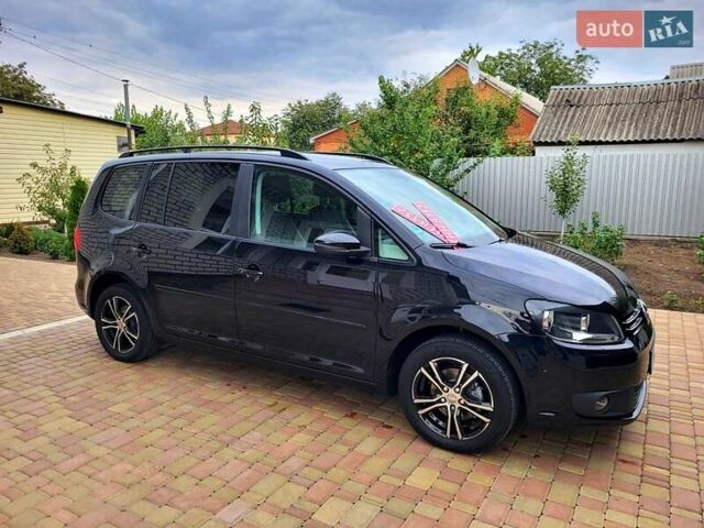 Черный Фольксваген Туран, объемом двигателя 1.6 л и пробегом 204 тыс. км за 11950 $, фото 20 на Automoto.ua