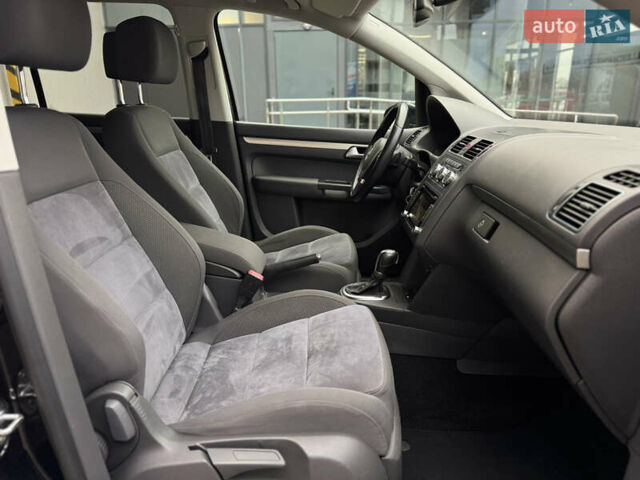 Черный Фольксваген Туран, объемом двигателя 1.4 л и пробегом 171 тыс. км за 10799 $, фото 18 на Automoto.ua