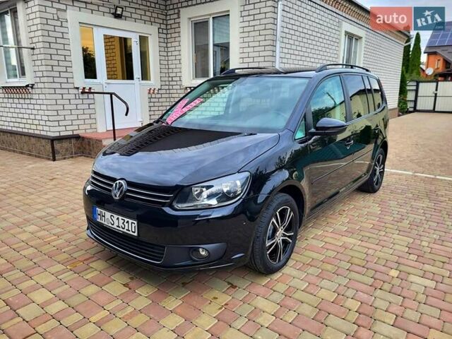 Черный Фольксваген Туран, объемом двигателя 1.6 л и пробегом 204 тыс. км за 11950 $, фото 3 на Automoto.ua