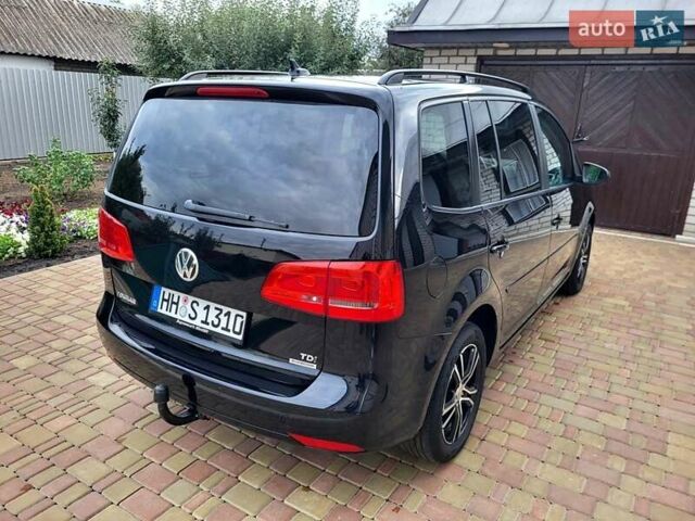 Черный Фольксваген Туран, объемом двигателя 1.6 л и пробегом 204 тыс. км за 11950 $, фото 16 на Automoto.ua