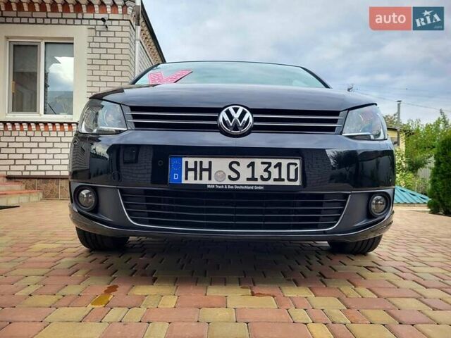 Черный Фольксваген Туран, объемом двигателя 1.6 л и пробегом 204 тыс. км за 11950 $, фото 25 на Automoto.ua