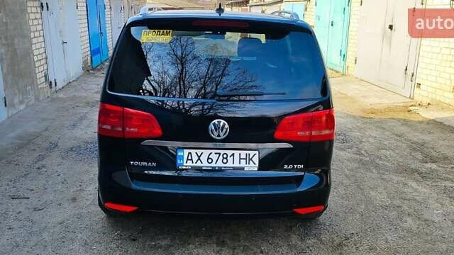Черный Фольксваген Туран, объемом двигателя 2 л и пробегом 234 тыс. км за 12400 $, фото 5 на Automoto.ua