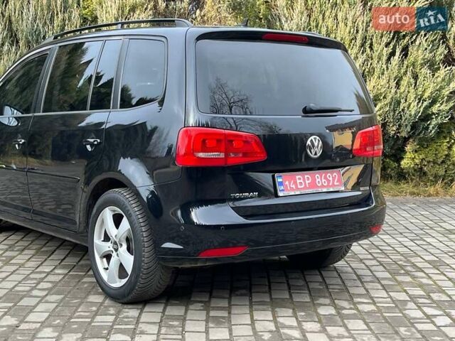 Чорний Фольксваген Туран, об'ємом двигуна 2 л та пробігом 199 тис. км за 13650 $, фото 16 на Automoto.ua