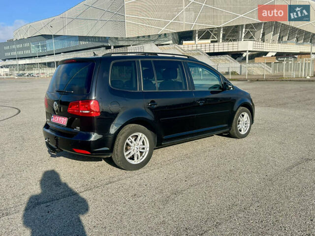 Черный Фольксваген Туран, объемом двигателя 1.6 л и пробегом 223 тыс. км за 11700 $, фото 7 на Automoto.ua