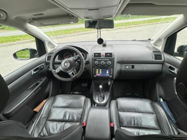 Черный Фольксваген Туран, объемом двигателя 1.4 л и пробегом 297 тыс. км за 7800 $, фото 10 на Automoto.ua