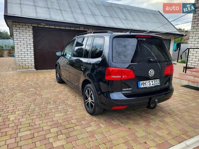 Черный Фольксваген Туран, объемом двигателя 1.6 л и пробегом 204 тыс. км за 11950 $, фото 12 на Automoto.ua