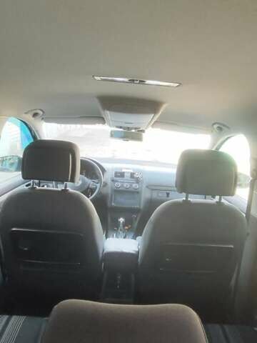 Черный Фольксваген Туран, объемом двигателя 2 л и пробегом 234 тыс. км за 12400 $, фото 1 на Automoto.ua