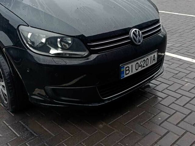 Черный Фольксваген Туран, объемом двигателя 1.4 л и пробегом 200 тыс. км за 10500 $, фото 4 на Automoto.ua