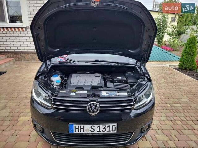 Черный Фольксваген Туран, объемом двигателя 1.6 л и пробегом 204 тыс. км за 11950 $, фото 87 на Automoto.ua