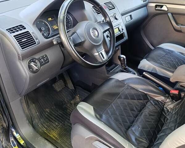 Черный Фольксваген Туран, объемом двигателя 1.6 л и пробегом 267 тыс. км за 11700 $, фото 3 на Automoto.ua