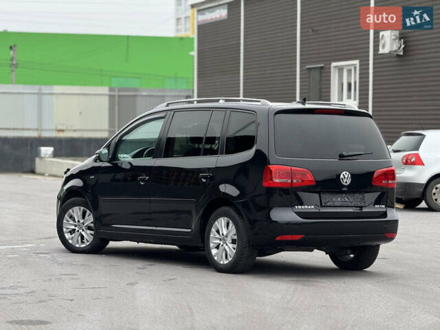 Чорний Фольксваген Туран, об'ємом двигуна 1.97 л та пробігом 243 тис. км за 12550 $, фото 4 на Automoto.ua