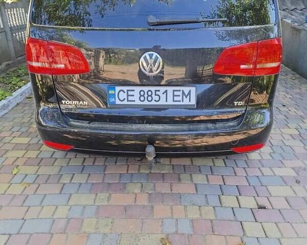 Черный Фольксваген Туран, объемом двигателя 1.6 л и пробегом 267 тыс. км за 11700 $, фото 1 на Automoto.ua