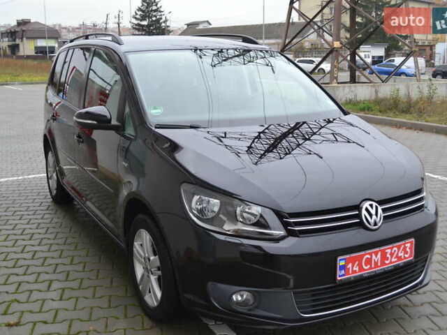 Черный Фольксваген Туран, объемом двигателя 2 л и пробегом 230 тыс. км за 14200 $, фото 1 на Automoto.ua