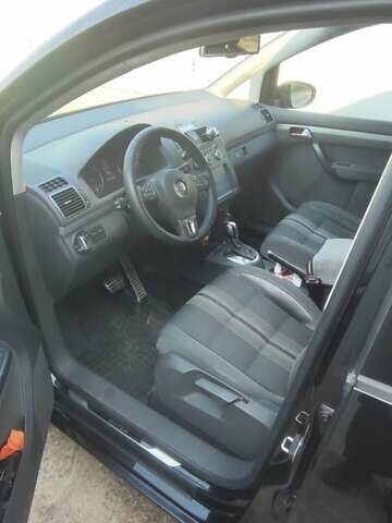 Черный Фольксваген Туран, объемом двигателя 2 л и пробегом 234 тыс. км за 12400 $, фото 3 на Automoto.ua