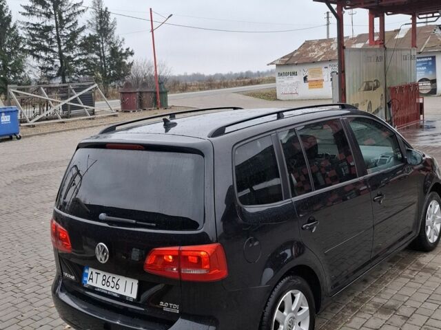 Черный Фольксваген Туран, объемом двигателя 2 л и пробегом 23 тыс. км за 14233 $, фото 1 на Automoto.ua