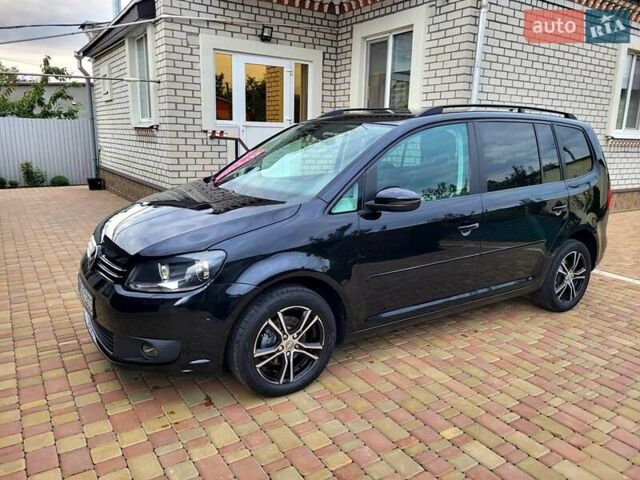 Черный Фольксваген Туран, объемом двигателя 1.6 л и пробегом 204 тыс. км за 11950 $, фото 6 на Automoto.ua