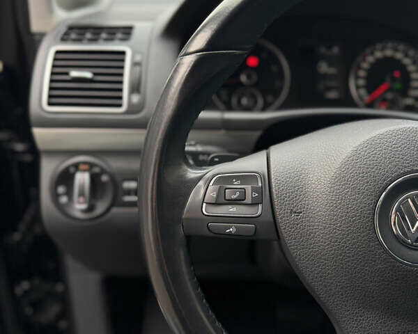 Черный Фольксваген Туран, объемом двигателя 1.4 л и пробегом 171 тыс. км за 10799 $, фото 10 на Automoto.ua