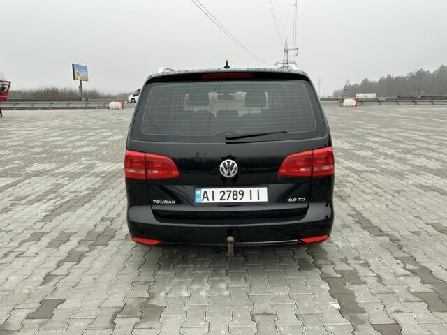 Черный Фольксваген Туран, объемом двигателя 2 л и пробегом 340 тыс. км за 9000 $, фото 1 на Automoto.ua