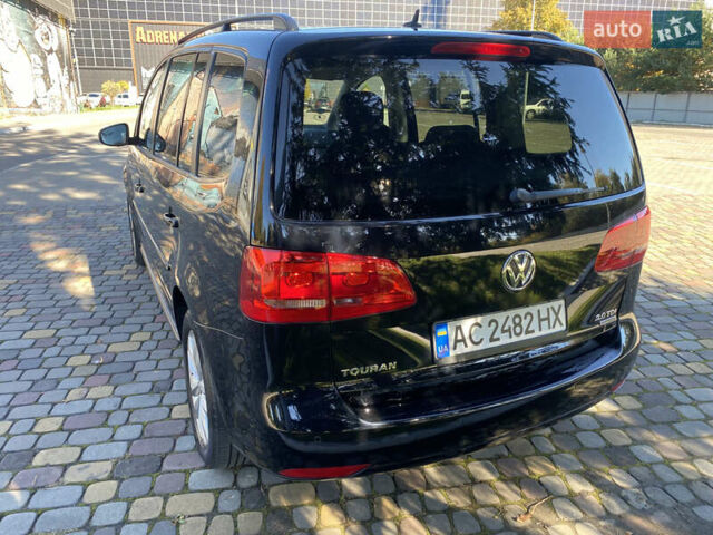 Черный Фольксваген Туран, объемом двигателя 1.97 л и пробегом 263 тыс. км за 10999 $, фото 7 на Automoto.ua