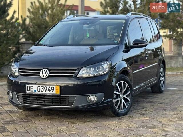 Чорний Фольксваген Туран, об'ємом двигуна 2 л та пробігом 172 тис. км за 14500 $, фото 3 на Automoto.ua
