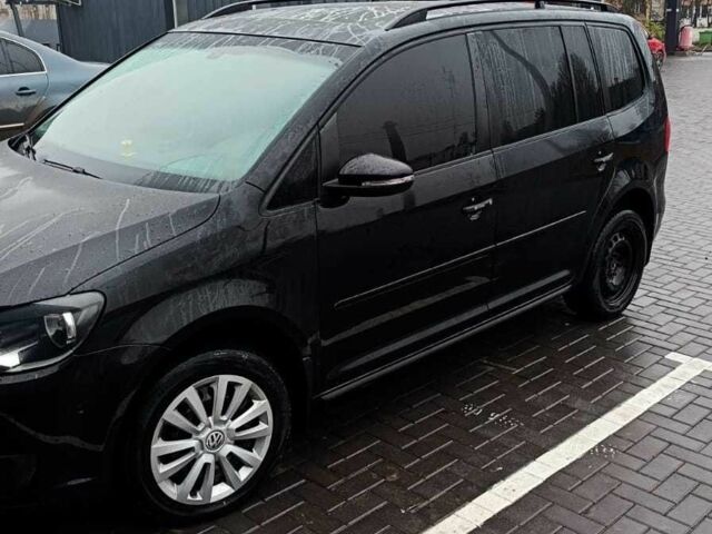 Черный Фольксваген Туран, объемом двигателя 1.4 л и пробегом 200 тыс. км за 10500 $, фото 2 на Automoto.ua