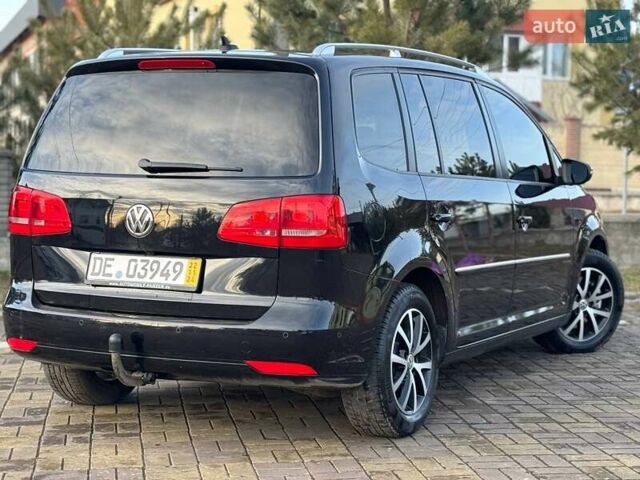 Чорний Фольксваген Туран, об'ємом двигуна 2 л та пробігом 172 тис. км за 14500 $, фото 32 на Automoto.ua