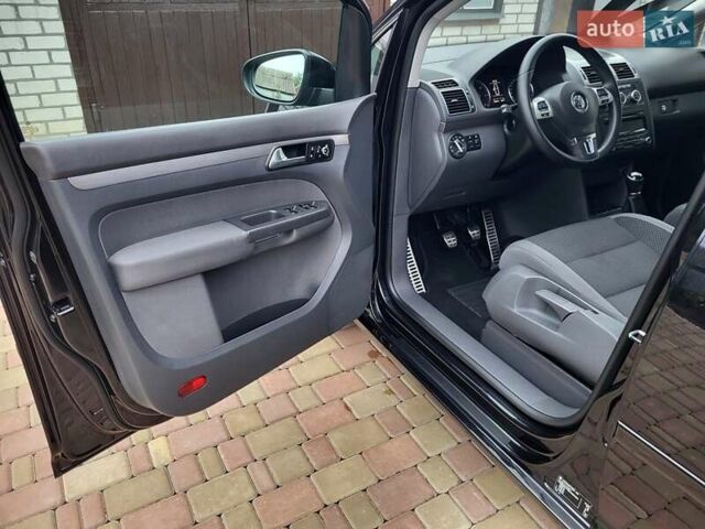 Черный Фольксваген Туран, объемом двигателя 1.6 л и пробегом 204 тыс. км за 11950 $, фото 46 на Automoto.ua