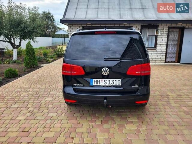 Черный Фольксваген Туран, объемом двигателя 1.6 л и пробегом 204 тыс. км за 11950 $, фото 14 на Automoto.ua