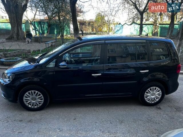 Чорний Фольксваген Туран, об'ємом двигуна 2 л та пробігом 228 тис. км за 12500 $, фото 6 на Automoto.ua