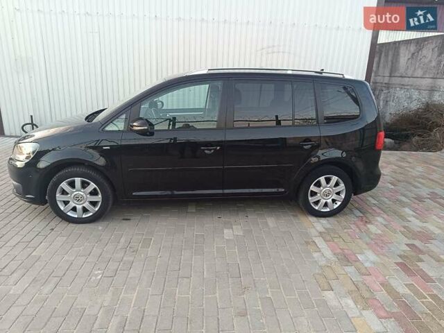 Черный Фольксваген Туран, объемом двигателя 1.6 л и пробегом 211 тыс. км за 12800 $, фото 24 на Automoto.ua