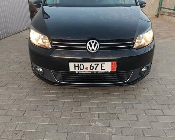 Черный Фольксваген Туран, объемом двигателя 1.6 л и пробегом 211 тыс. км за 12800 $, фото 7 на Automoto.ua