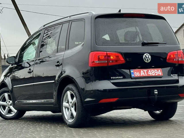 Черный Фольксваген Туран, объемом двигателя 2 л и пробегом 196 тыс. км за 14599 $, фото 2 на Automoto.ua
