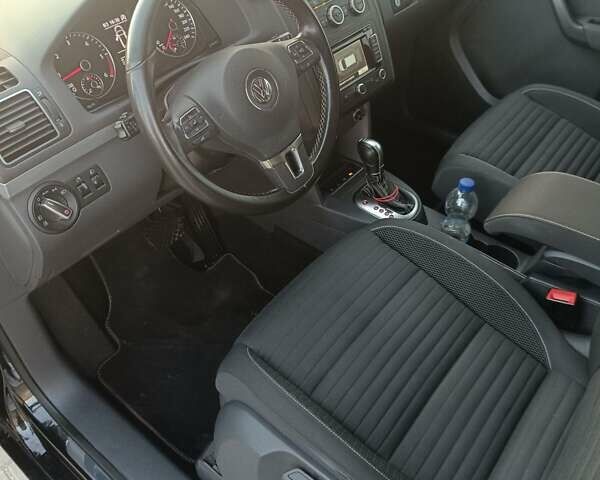 Черный Фольксваген Туран, объемом двигателя 1.6 л и пробегом 211 тыс. км за 12800 $, фото 20 на Automoto.ua