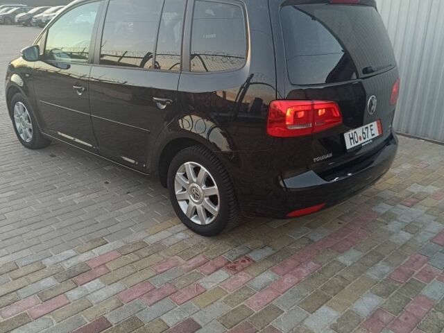 Черный Фольксваген Туран, объемом двигателя 0 л и пробегом 211 тыс. км за 12800 $, фото 2 на Automoto.ua