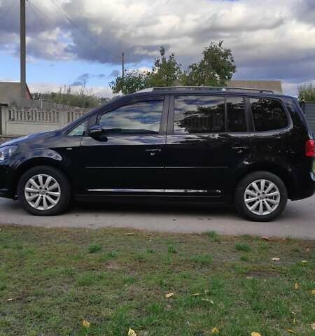 Черный Фольксваген Туран, объемом двигателя 1.97 л и пробегом 349 тыс. км за 13300 $, фото 9 на Automoto.ua