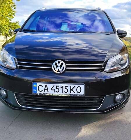 Черный Фольксваген Туран, объемом двигателя 1.97 л и пробегом 349 тыс. км за 13300 $, фото 14 на Automoto.ua