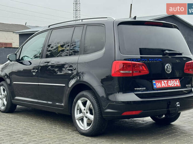 Черный Фольксваген Туран, объемом двигателя 2 л и пробегом 196 тыс. км за 14599 $, фото 24 на Automoto.ua
